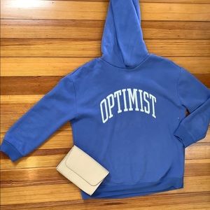 Blue “Optimist” sweatshirt